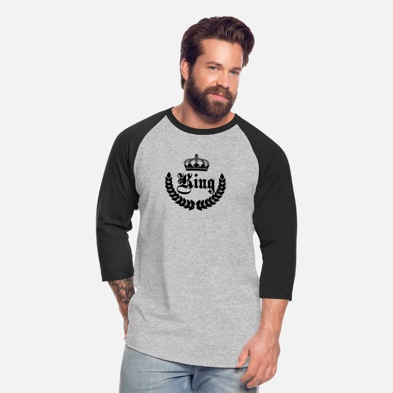 King text in half laurel wreath with crown